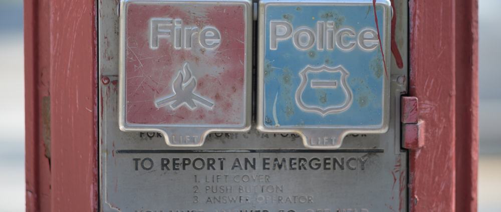 Buttons to report a fire or call police