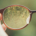 a person holding their glasses
