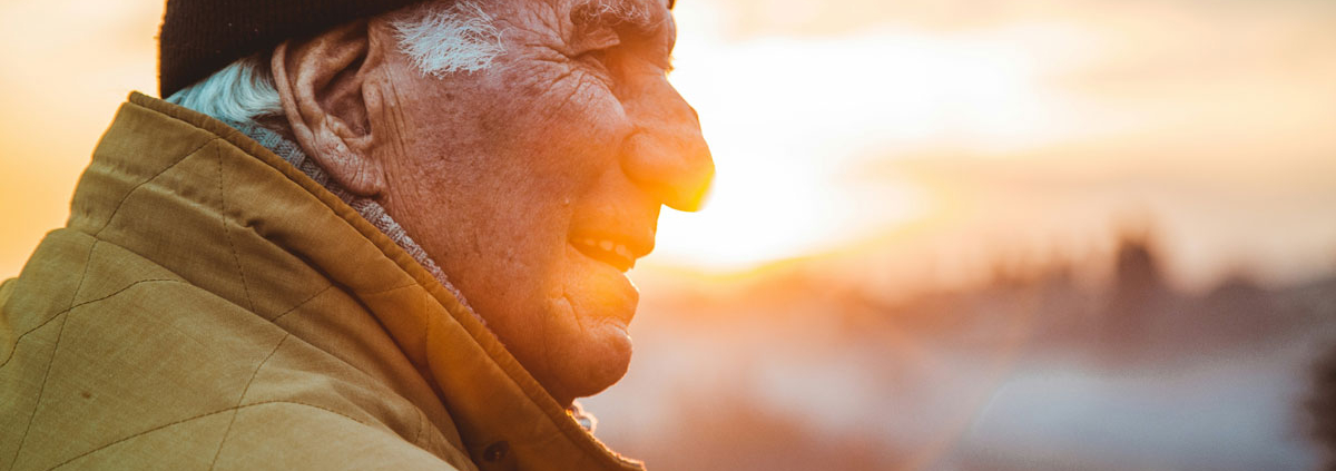 man looking at sunset
