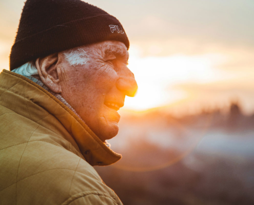 man looking at sunset