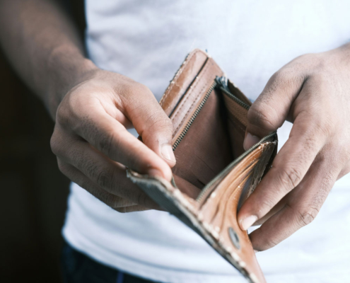 man holding an empty wallet