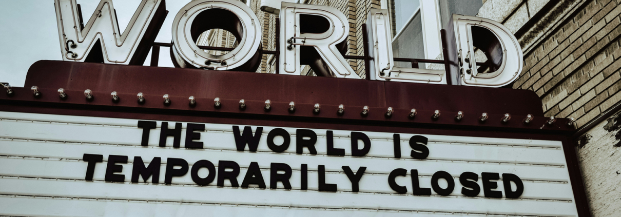 marquee displaying words "the world is temporarily closed"