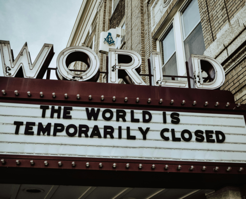 marquee displaying words "the world is temporarily closed"