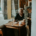 man sits alone at a table