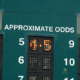 board displaying the odds for a race
