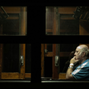 we-to-me man sitting along in a train car