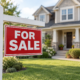 for sale sign in front of a home